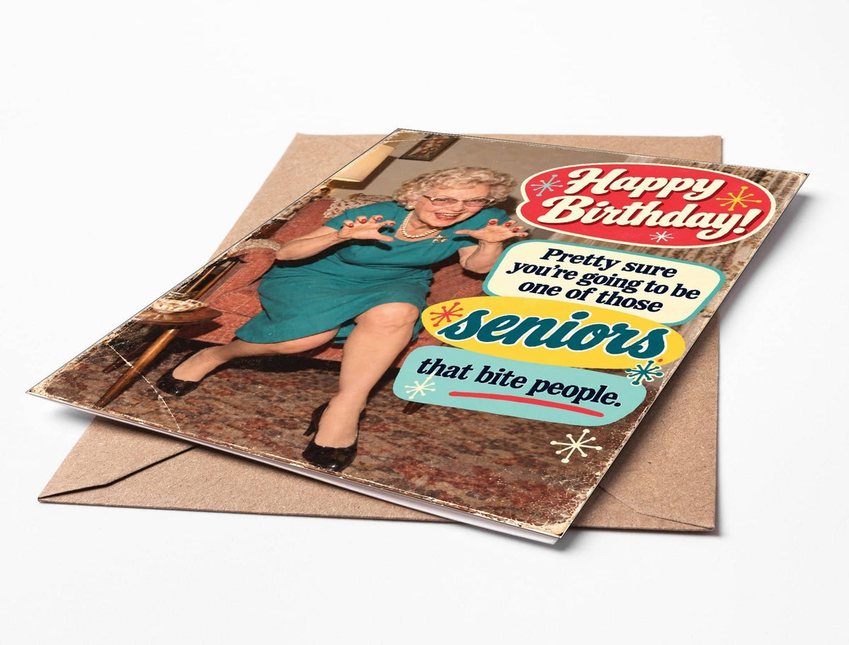 Biting Seniors Greeting Card