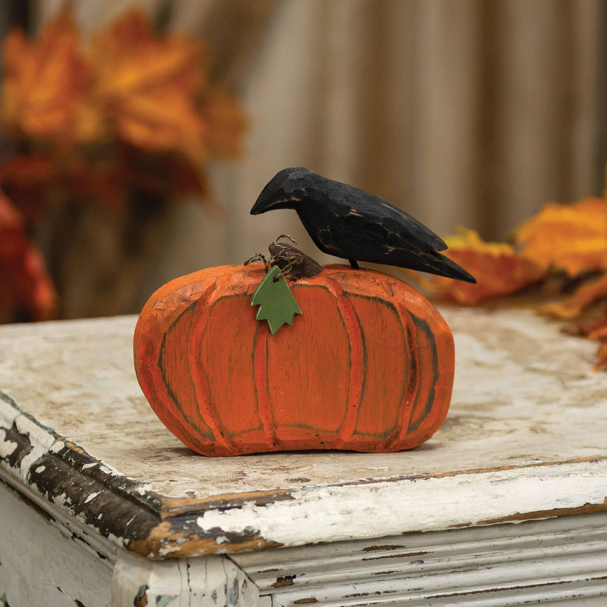 Distressed Carved Wooden Crow on Pumpkin